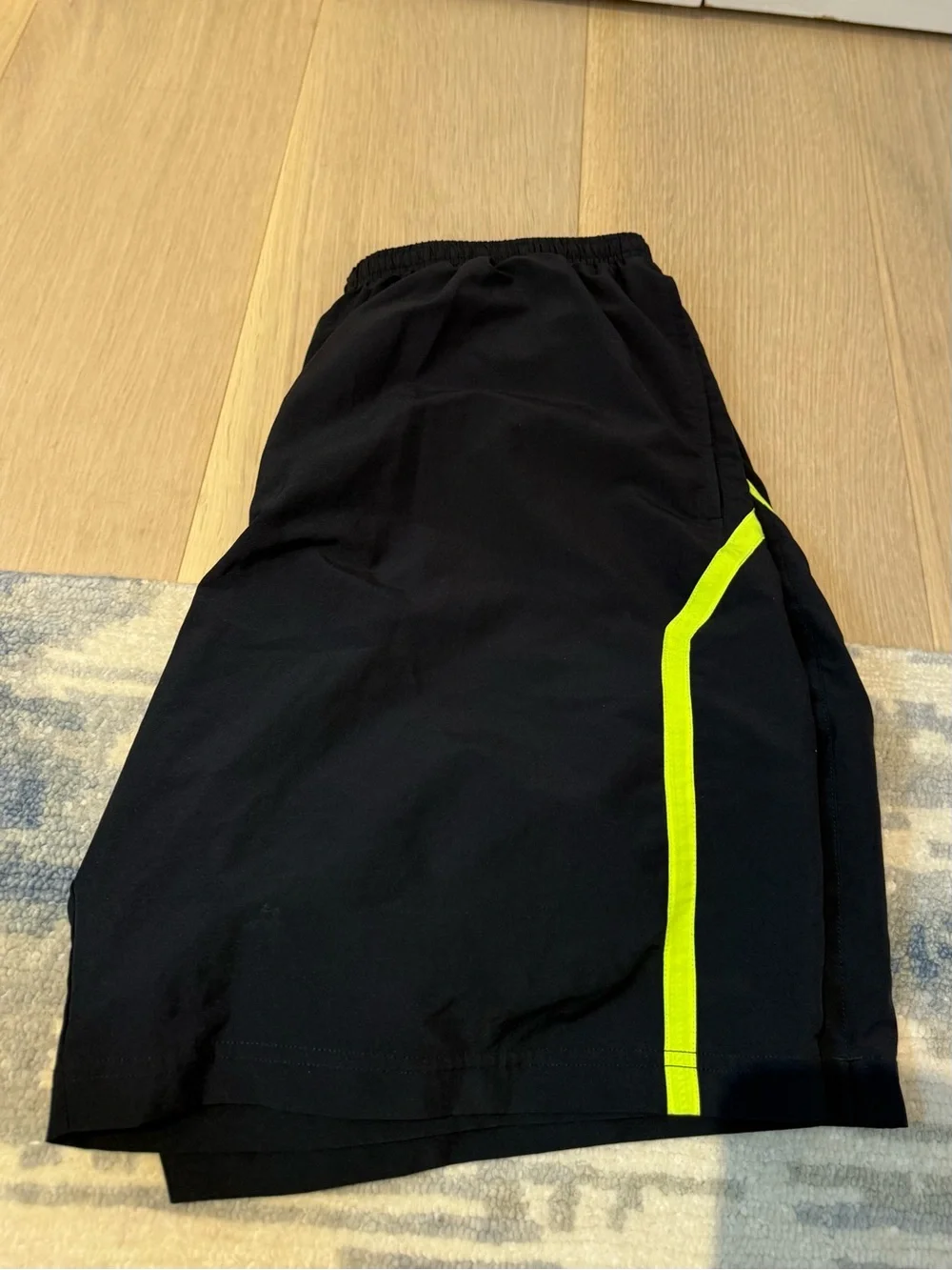 Under Armour Men’s Black Athletic Shorts with Neon Yellow Trim